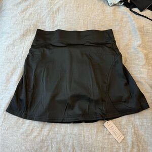Tennis skirt. Never worn. Size Xl